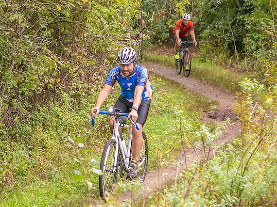 riders on a dirt bike path